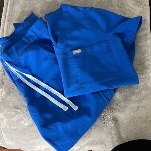 Figs Scrubs. Size M. Still in good condition.